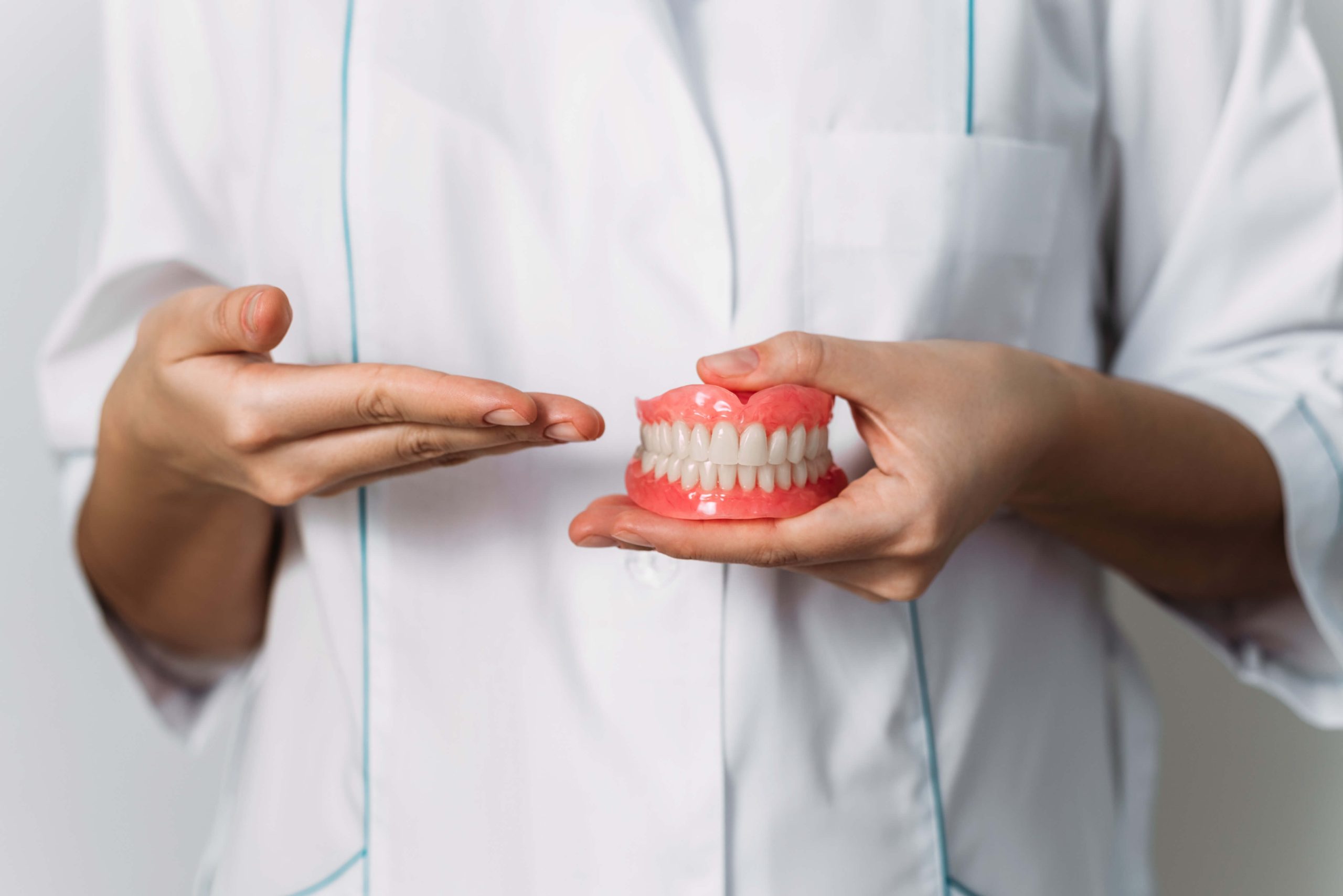 how partial dentures fit over your gum